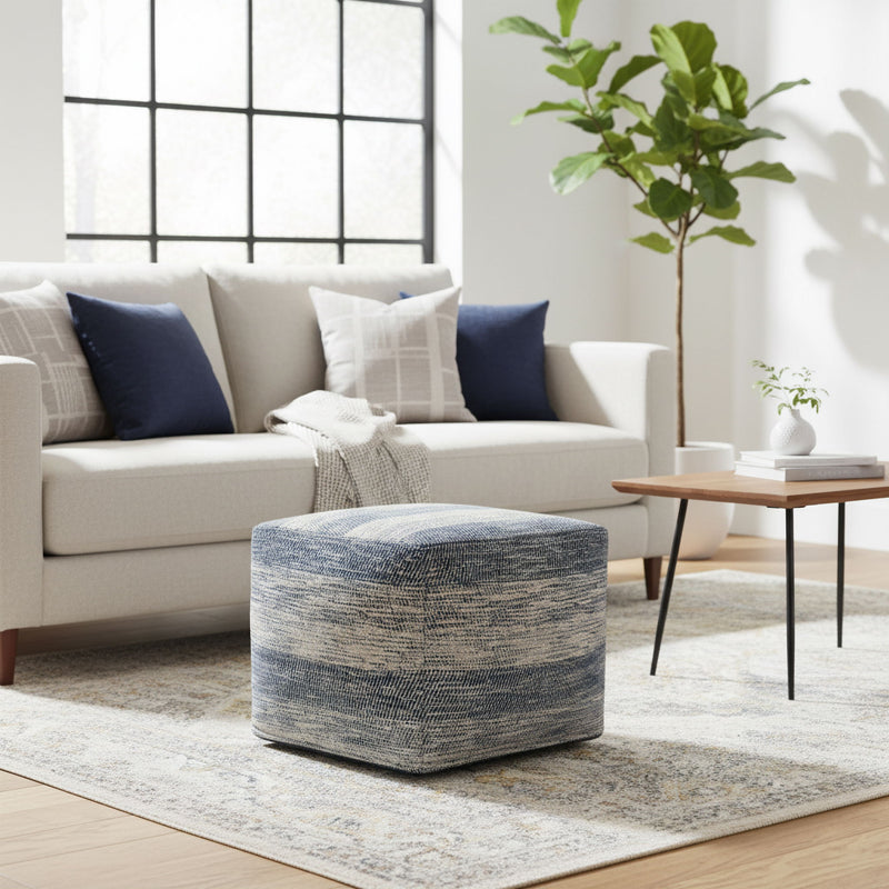 Simpli-Home square upholstered clay-colored accent pouf, soft fabric with tufted top, versatile for living room or seating area.