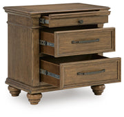 Medium brown Karallin three-drawer nightstand by Signature Design Ashley, featuring a sleek accent piece for bedroom storage.
