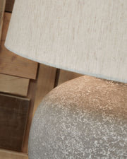 Dreward - Paper Table Lamp - Distressed Gray - R&R Furniture Gallery (Fountain Valley, CA)
