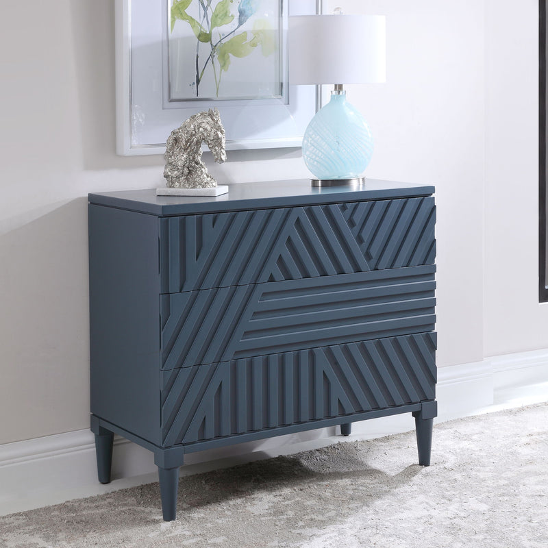 Uttermost Colby accent drawer chest with a sleek finish and modern design, featuring multiple storage drawers and stylish metal handles.