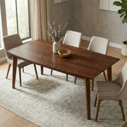 Rectangular dining table by Simpli-Home with wooden top and sturdy legs, ideal for kitchen or dining room seating