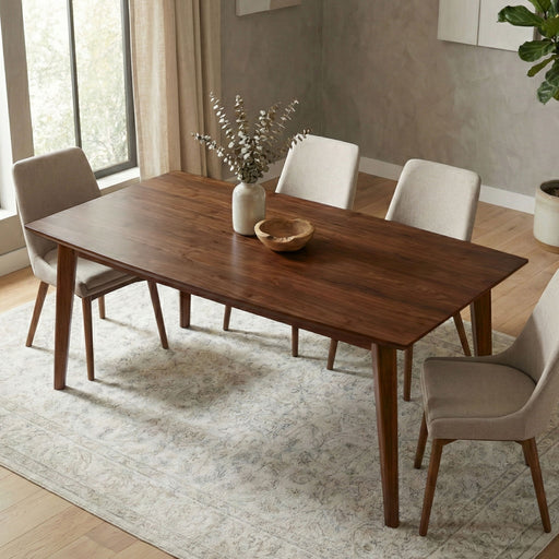 Rectangular dining table by Simpli-Home with wooden top and sturdy legs, ideal for kitchen or dining room seating