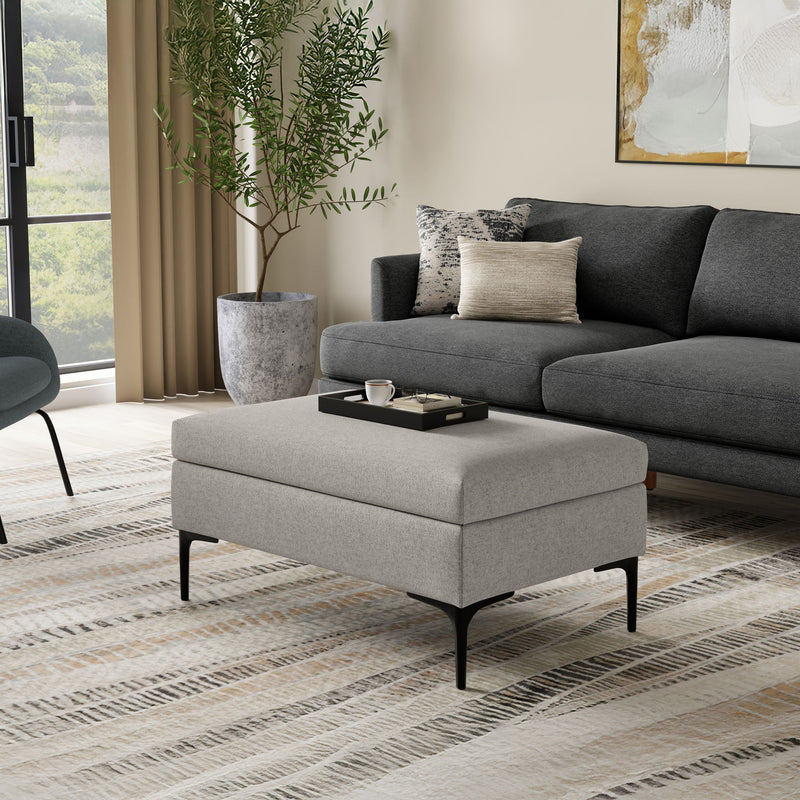 Simpli-Home Rebecca multifunctional coffee table storage ottoman with lift-up lid and soft fabric upholstery.