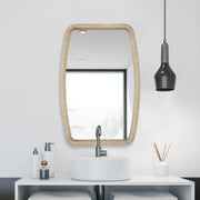 Gold Tiki accent mirror by Uttermost featuring a tropical-inspired wooden frame with polished gold finish.