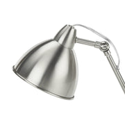 Modern 8th Street nickel metal table lamp with silver shade and built-in USB port for convenient charging.