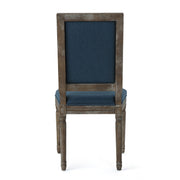 Set of traditional style Noble House dining chairs with fabric upholstery, featuring elegant wooden frames and plush cushioned seats.