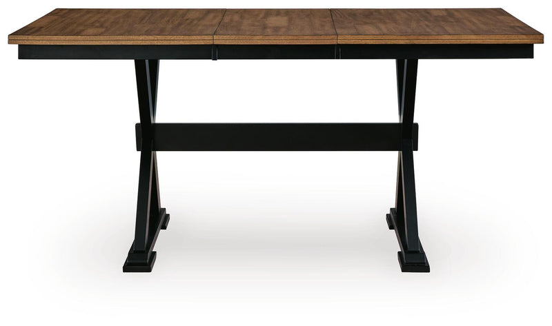 Signature Design by Ashley Wildenauer dining room extension table with a sleek counter table design, showcased in a modern setting.