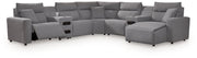 Signature Design by Ashley Modmax II reclining sectional in salt and pepper fabric, featuring plush cushions and modern design.