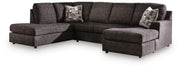 Signature Design by Ashley Lentiz stationary sectional sofa with plush cushions and modern design in a cozy living room setting.