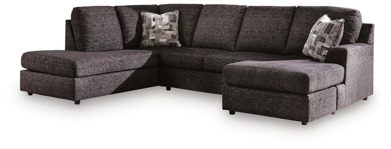 Signature Design by Ashley Lentiz stationary sectional sofa with plush cushions and modern design in a cozy living room setting.