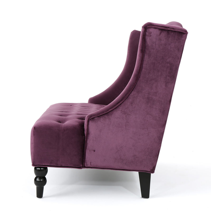 Noble House upholstered loveseat with wingback design and diamond tufting, featuring plush fabric and elegant style.