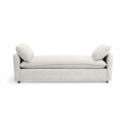 Classic Home Caplan backless sofa daybed with plush cushioning and wooden legs, ideal for modern living spaces.