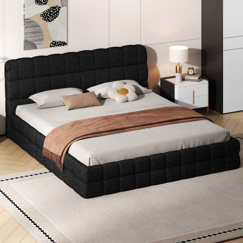 Dreamland upholstered platform bed with a plush headboard and modern design, showcasing the bed's fabric and sturdy frame.