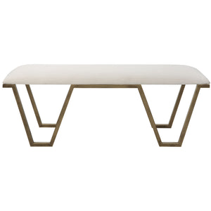 White geometric accent bench by Uttermost with a modern, minimalist design and sleek metal legs.