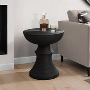 Black round indoor-outdoor accent table by 8th Street, featuring a sleek design and sturdy surface for versatile use.