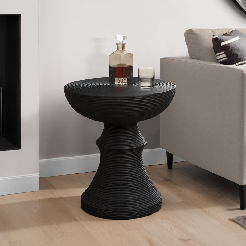 Black round indoor-outdoor accent table by 8th Street, featuring a sleek design and sturdy surface for versatile use.