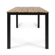 Black rectangular outdoor dining table with iron legs, suitable for patio or garden dining spaces by Noble House.