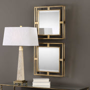 Pair of gold square wall mirrors from the Allick set by Uttermost, featuring sleek geometric design and modern decor style.