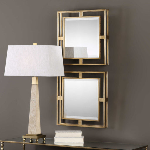 Pair of gold square wall mirrors from the Allick set by Uttermost, featuring sleek geometric design and modern decor style.