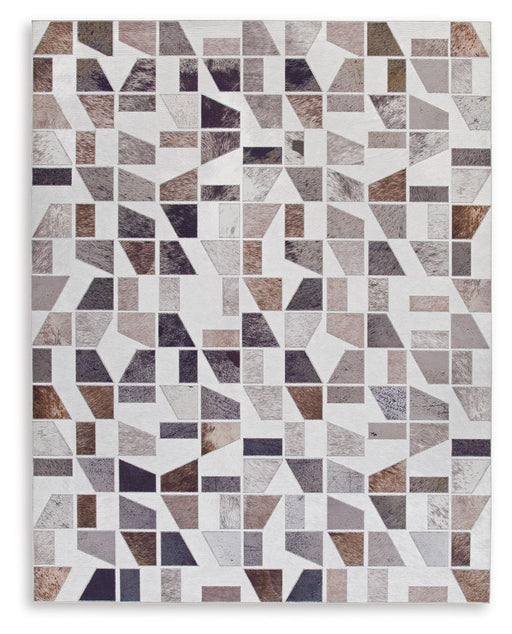 Signature Design by Ashley Jettner area rug with geometric pattern in neutral tones, showcasing soft woven fabric and decorative edges.