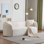 Noble House Coral curved 3-seater stationary sofa with plush cushions and modern design in a living room setting