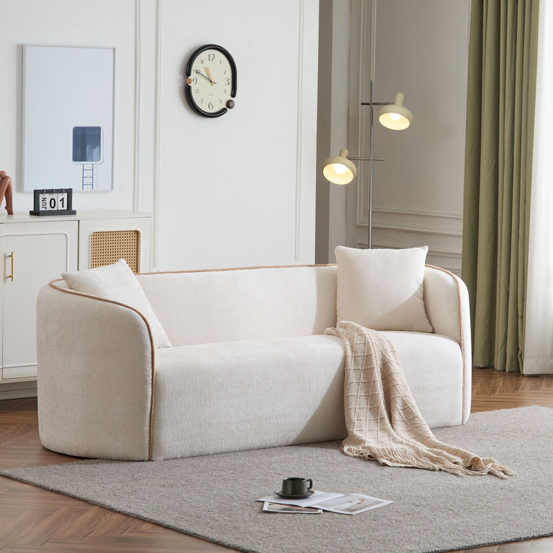 Noble House Coral curved 3-seater stationary sofa with plush cushions and modern design in a living room setting