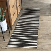 Classic Home Palma stripe area rug with a modern design, featuring bold stripes in neutral colors, perfect for contemporary interior decor.