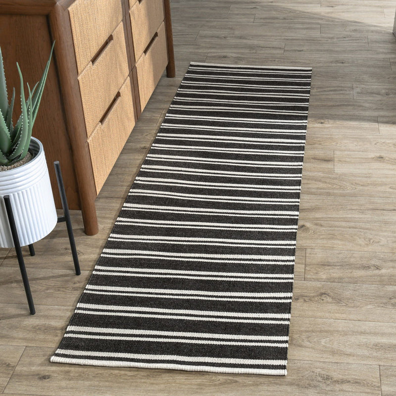Classic Home Palma stripe area rug with a modern design, featuring bold stripes in neutral colors, perfect for contemporary interior decor.