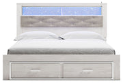 Altyra - King Upholstered Bookcase Bed With Storage - White - R&R Furniture Gallery (Fountain Valley, CA)