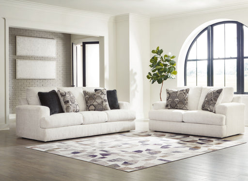 Signature Design by Ashley Karinne living room set with stationary chair and ottoman, stylish and comfortable home furniture.