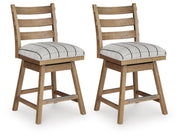 Pair of Benchcraft® Ridgester upholstered swivel barstools in light brown with cushioned seats and backrests, set of two.
