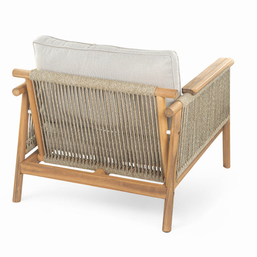 Noble House Sumbawa outdoor club arm chair with woven rattan frame and cushioned seat, ideal for patio or garden relaxing.