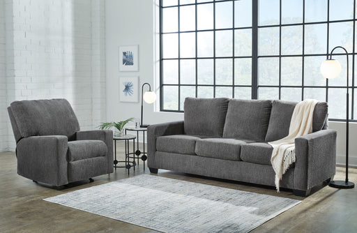 Signature Design by Ashley Rannis 2-piece living room set featuring a plush sofa and matching loveseat in neutral upholstery.