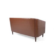 Sophisticated Loveseat With Diamond Stitched Detailing - R&R Furniture Gallery (Fountain Valley, CA)
