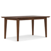 Contemporary Colby dining table by Simpli-Home with wooden surface and sturdy legs, ideal for modern dining rooms.
