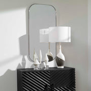 Uttermost Taft wall mirror with a sleek, modern frame, showcasing a stylish and reflective surface for contemporary home decor.