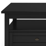 Handcrafted Warm Shaker coffee table from Simpli-Home featuring a wooden tabletop and sturdy legs in a warm finish.