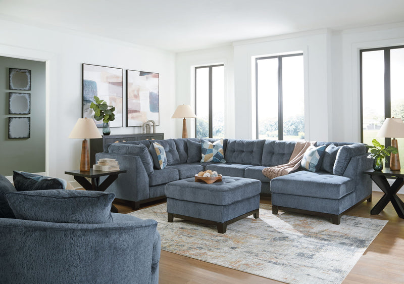 Benchcraft Maxon Place 5-piece living room set featuring a sofa, loveseat, armchair, and matching ottomans in a stylish living space.