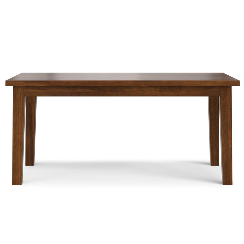 Simpli-Home handcrafted Eastwood dining table with a wooden surface and sturdy legs, ideal for family meals and gatherings.