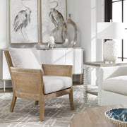 Uttermost Encore natural armchair in white with plush upholstery and wooden legs, stylish and comfortable for modern living rooms.