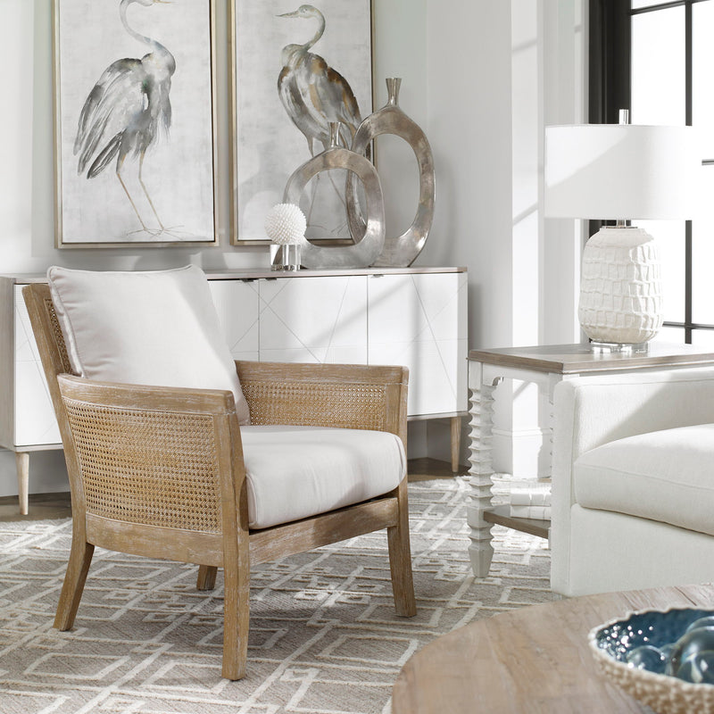 Uttermost Encore natural armchair in white with plush upholstery and wooden legs, stylish and comfortable for modern living rooms.