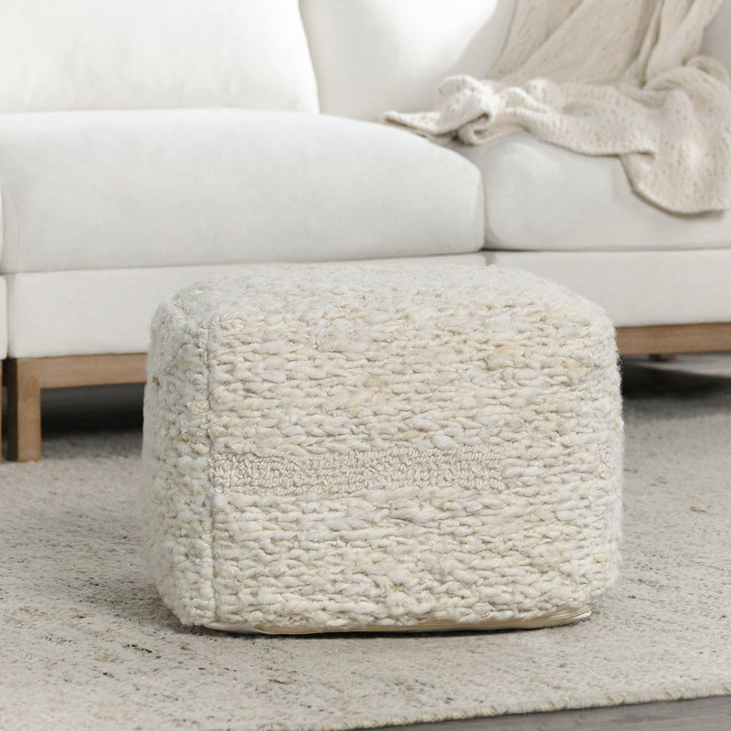 Ivory Sinclair accent pouf by Classic Home, round fabric ottoman with tufted top, perfect for living room or bedroom decor.