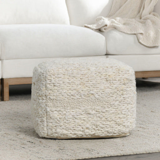 Ivory Sinclair accent pouf by Classic Home, round fabric ottoman with tufted top, perfect for living room or bedroom decor.
