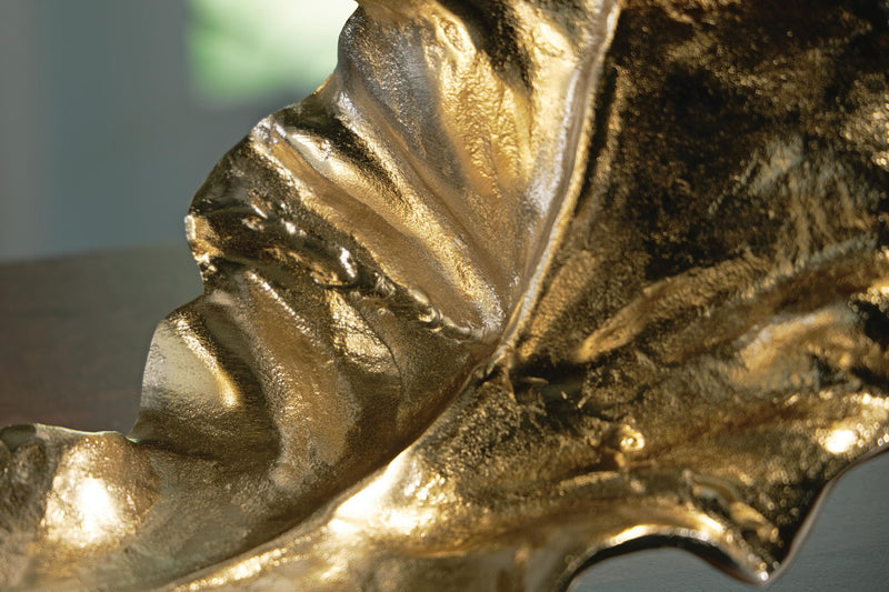 Gold and silver finish Darinsen sculpture by Signature Design by Ashley, featuring modern abstract figurine artwork.