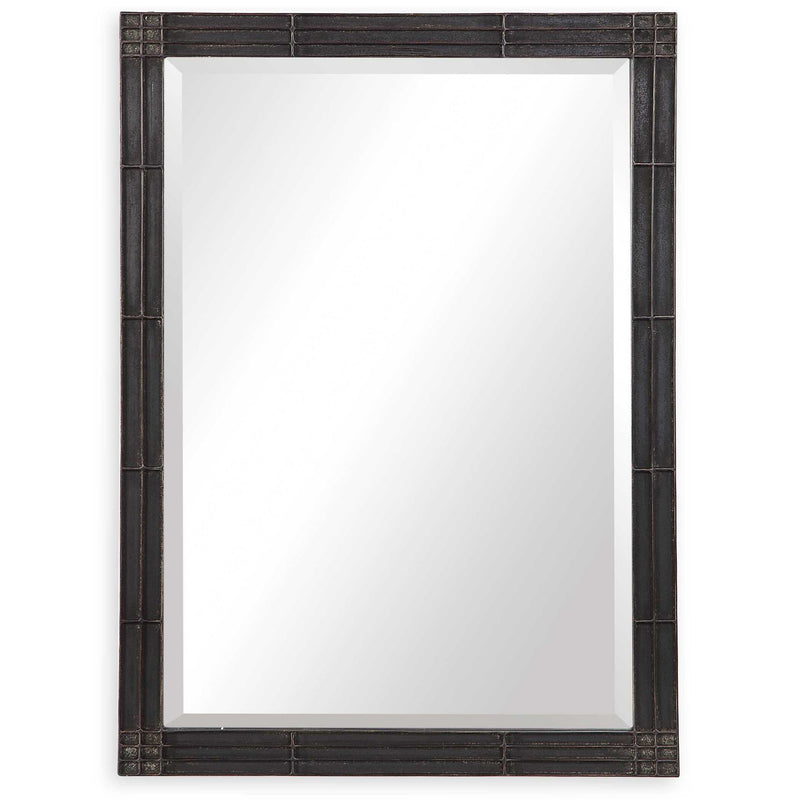 Uttermost Gower vanity mirror in aged black with a sleek, modern design reflecting natural light and interior decor.
