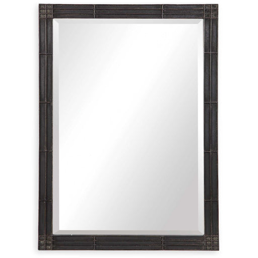 Uttermost Gower vanity mirror in aged black with a sleek, modern design reflecting natural light and interior decor.