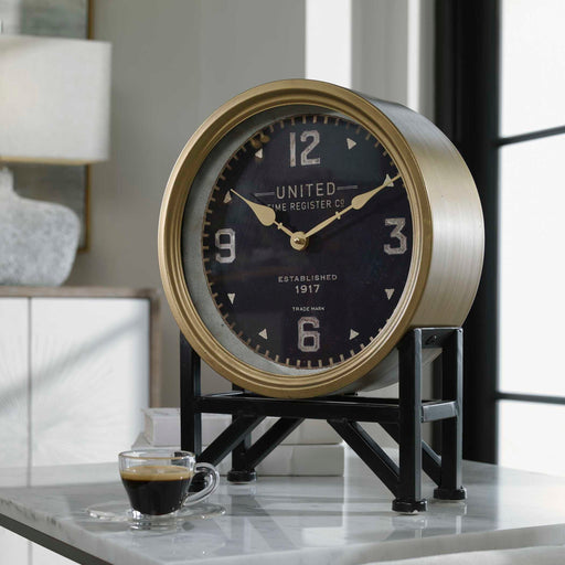 Black Shyam tabletop clock by Uttermost, featuring a sleek, modern design for stylish home or office decor.