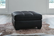 Benchcraft® Barlin Mills oversized accent ottoman with plush fabric and modern design, perfect for living room or lounge decor.