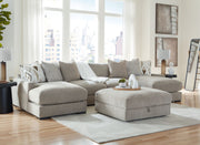 Benchcraft® Aslan Court 5-piece sectional with ottoman set, featuring plush fabric and modern design in a stylish living room setup.