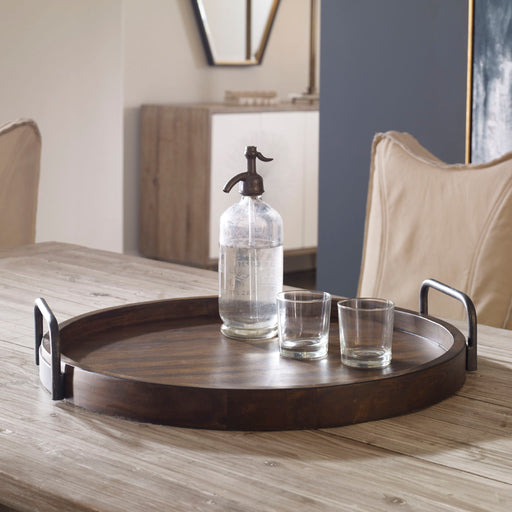 Dark brown round wooden tray from Uttermost Reine collection, featuring a smooth finish and sturdy construction.